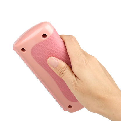 Pet Grooming Comb held in hand, showcasing its ergonomic design for easy use and effective grooming.